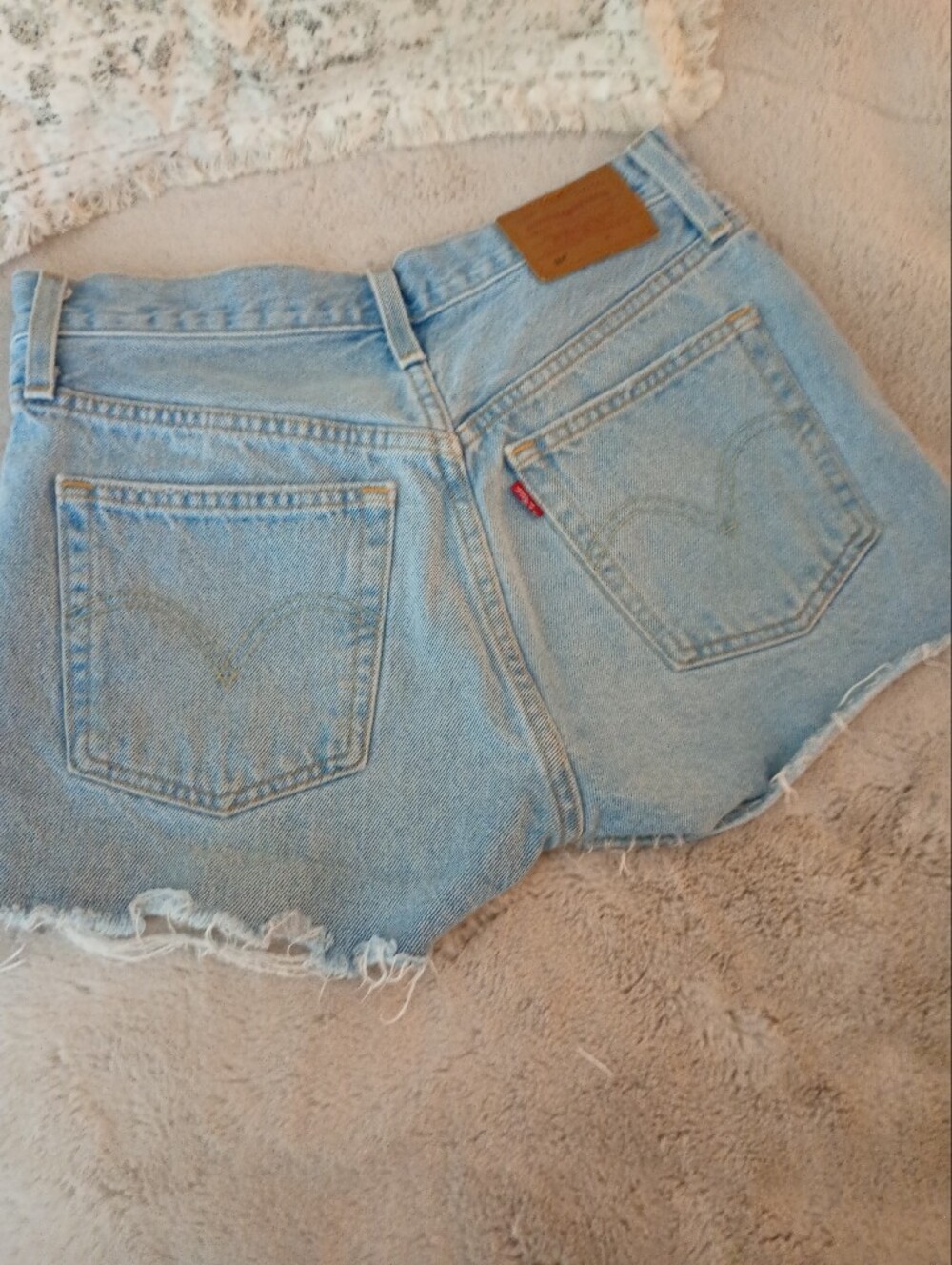 Levi's | 501 Light Blue Distressed Denim Cutoff Button Fly Shorts |